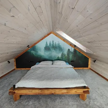 Nad Jeziorem Sunia بيت للعطل *